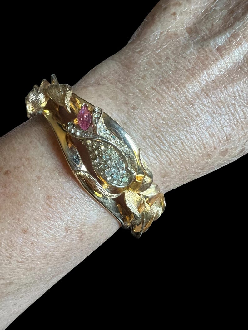 1980's Vintage Kirks Folly Gold Tone Cuff Bracelet Floral Rhinestone and Leaf Design